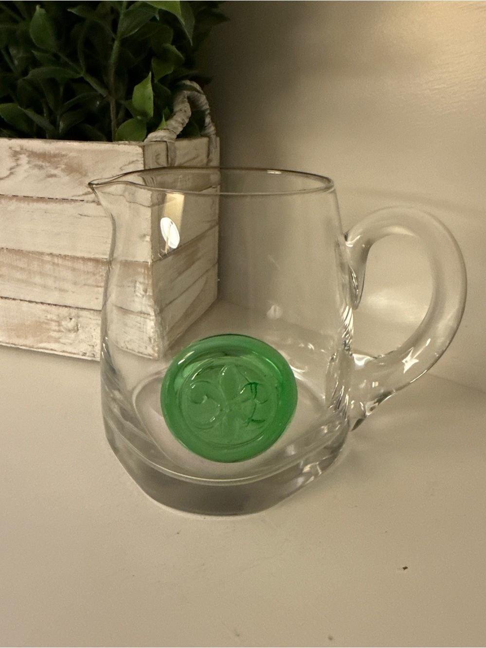 Art Glass Pitcher Green Fleur de Lis Medallion Clear Glass 5”